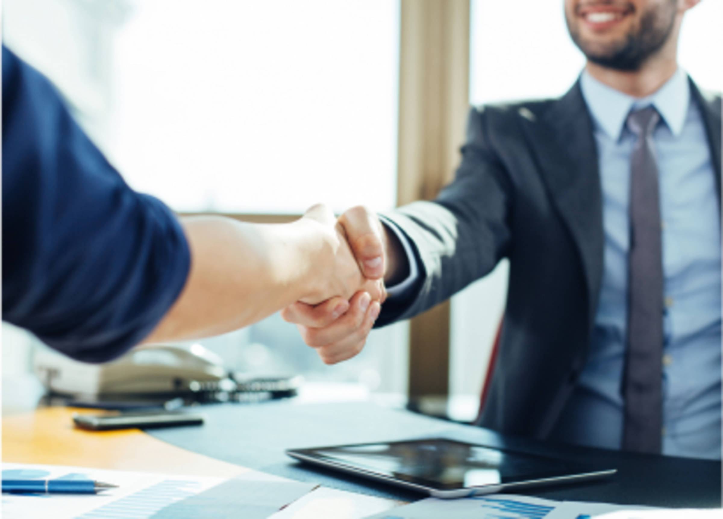 Close up of business handshake in the office